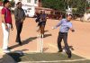 Divisional Commissioner Sanjeev Verma testing his bowling skills in a match organized during ongoing 7th Eid-Diwali Milan Cricket Cup at Parade Ground Jammu on Tuesday.