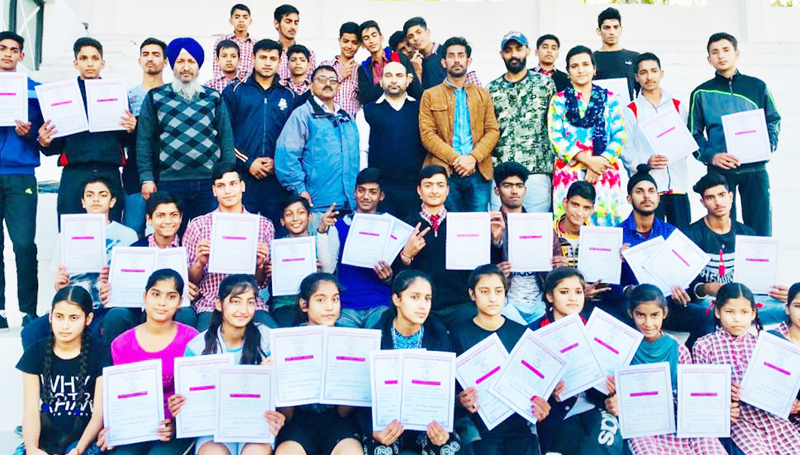Winners of Athletic Meet and dignitaries posing for group photograph. Winners of Athletic Meet and dignitaries posing for group photograph.