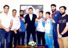 Union Sports Minister along with Indian Wushu team posing for group photograph.