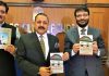 Union Minister Dr Jitendra Singh, flanked by DG Prasar Bharati Fayyaz Shehryar, releasing the book titled “Radio Kashmir: In times of peace & war” written by Rajesh Bhat, at Press Club of India, New Delhi on Tuesday.
