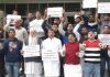 NPP leaders and activists staging protest outside SPCB office in Jammu on Tuesday.