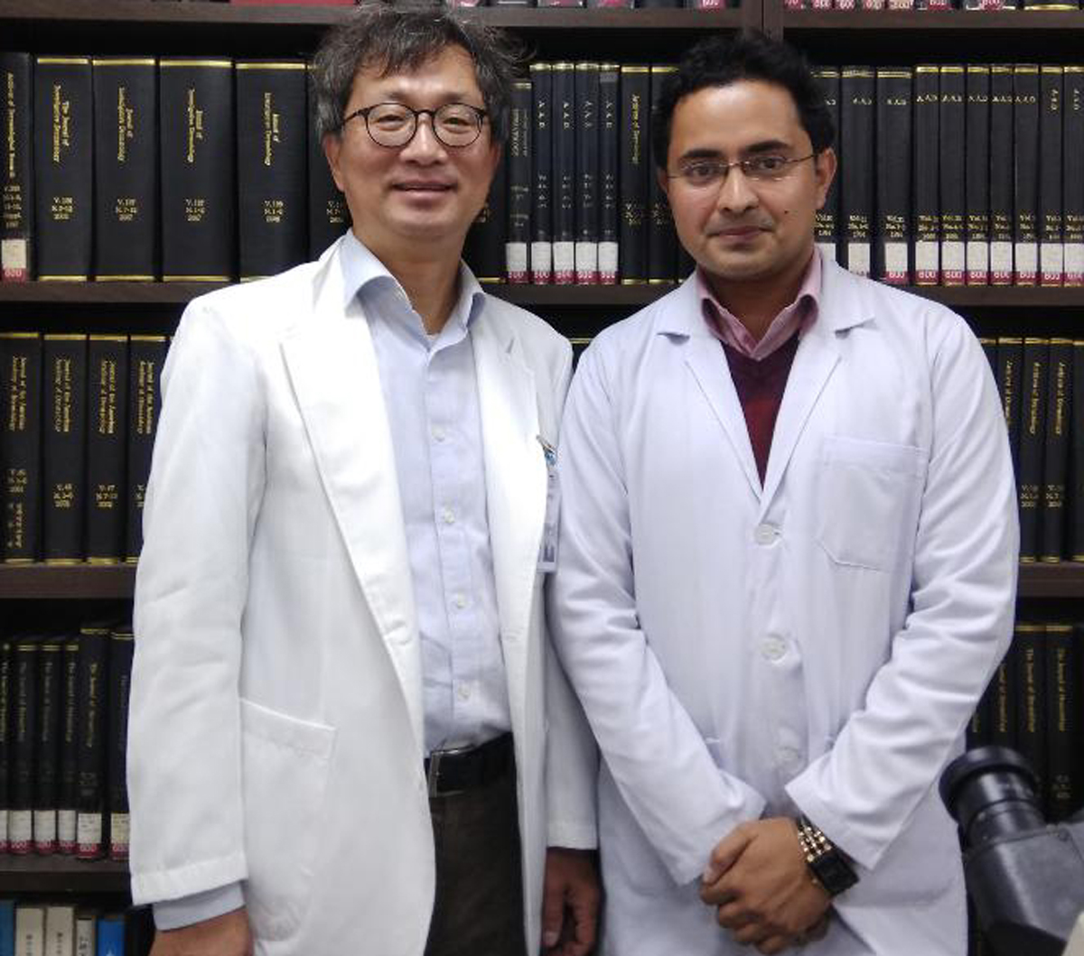 Dr Mrinal Gupta posing with a member of Korean Dermatological Association. Dr Mrinal Gupta posing with a member of Korean Dermatological Association.