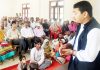 MLA Ramnagar, RS Pathania, addressing a public meeting at Dhamma in Majalta.