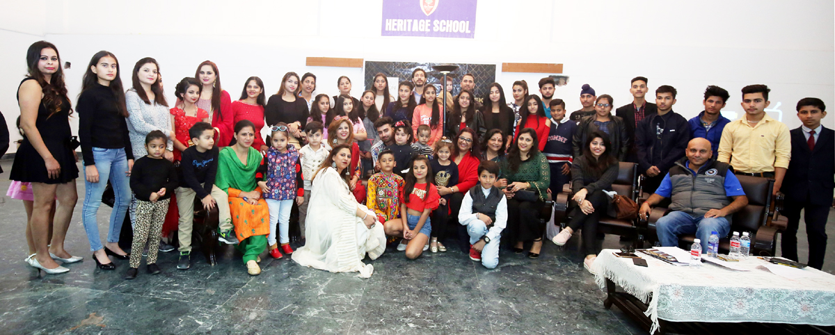 Aspiring candidates of Jammu Fashion Week posing for a group photograph after Catwalk Training at Jammu on Sunday. Aspiring candidates of Jammu Fashion Week posing for a group photograph after Catwalk Training at Jammu on Sunday.