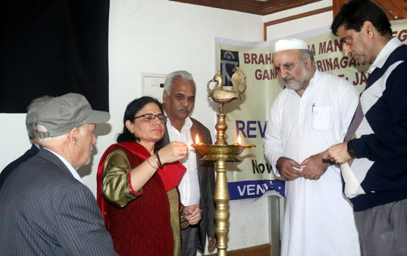 Dignitaries lighting a lamp during a seminar on save Sharda at Jammu on Monday. Dignitaries lighting a lamp during a seminar on save Sharda at Jammu on Monday.
