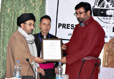 Chairman Legislative Council Haji Anayat Ali being presented a souvenir on occasion of inauguration of Press Club of Kargil on Thursday. Chairman Legislative Council Haji Anayat Ali being presented a souvenir on occasion of inauguration of Press Club of Kargil on Thursday.