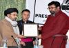 Chairman Legislative Council Haji Anayat Ali being presented a souvenir on occasion of inauguration of Press Club of Kargil on Thursday.