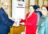 Secretary Department of Rural Development & PR, Sheetal Nanda handing over a glass-made water bottle to Chief Secretary BVR Subrahamanyam in Civil Secretariat at Jammu on Tuesday.