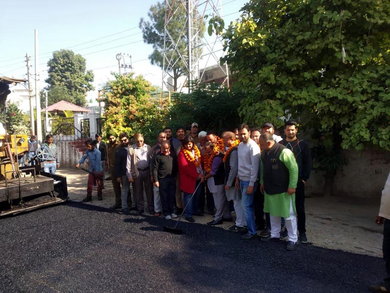 MLC Vikram Randhawa starting road blacktopping work at Gandhi Nagar in Jammu on Saturday. MLC Vikram Randhawa starting road blacktopping work at Gandhi Nagar in Jammu on Saturday.