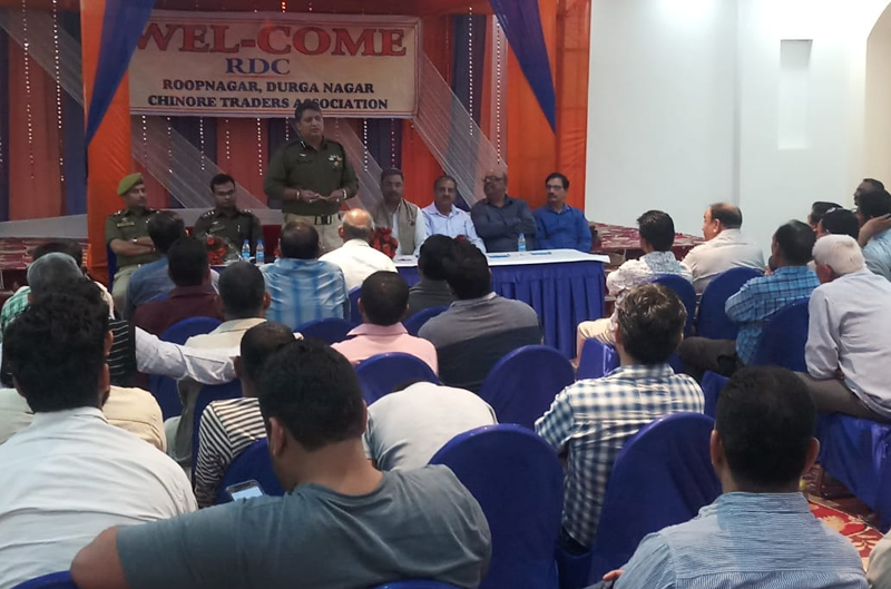 SP Rural Dushyant Sharma addressing traders in Chinore on Thursday. SP Rural Dushyant Sharma addressing traders in Chinore on Thursday.