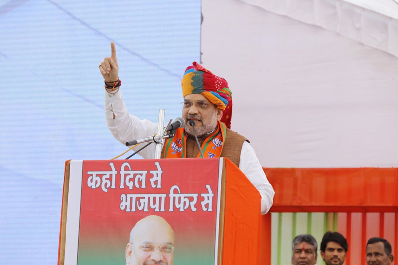 BJP president Amit Shah addressing a rally at Chittorgarh in Rajasthan. BJP president Amit Shah addressing a rally at Chittorgarh in Rajasthan.