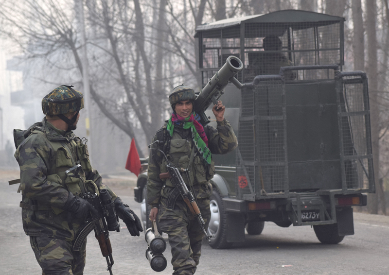Army men in action during an encounter at Mujgund on the outskirts of Srinagar. —Excelsior/Shakeel Army men in action during an encounter at Mujgund on the outskirts of Srinagar. —Excelsior/Shakeel