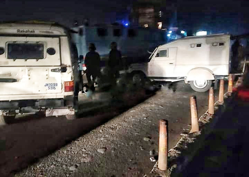 Security vehicles at the site of encounter at Mujgund in Srinagar on Saturday. —Excelsior/Shakeel Security vehicles at the site of encounter at Mujgund in Srinagar on Saturday. —Excelsior/Shakeel