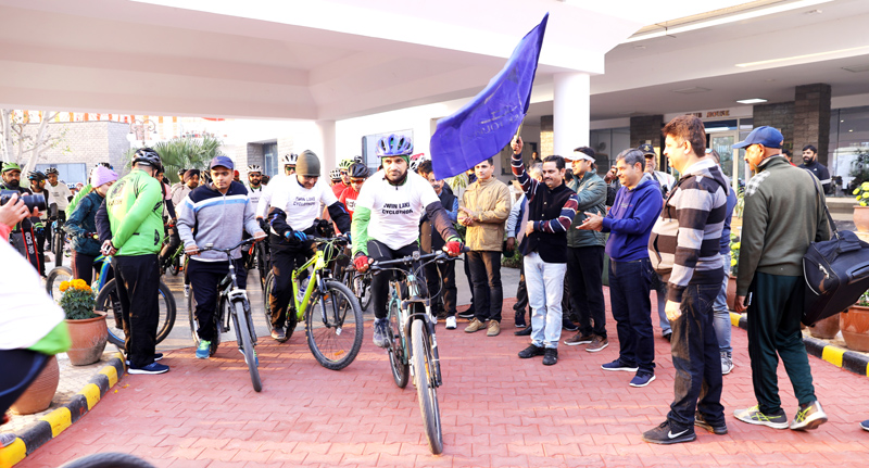 Director Tourism flagging of a cyclist on Sunday. Director Tourism flagging of a cyclist on Sunday.