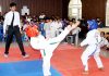 Players in action during a Taekwondo match at Rotary Club, Jammu.