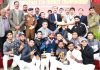 IGP Jammu Zone Dr SD Singh presenting the title trophy of the 6th Christmas T20 Championship to winner team at Jammu on Sunday.