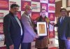 Principal Doon International School Jammu, Dr Vikesh Kaur receiving prestigious award in Agra.