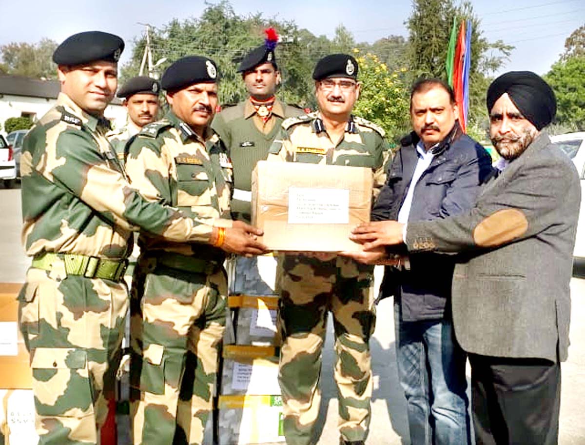 Officers of Income Tax Department presenting a box containing greeting cards made by students to BSF officers at Jammu. Officers of Income Tax Department presenting a box containing greeting cards made by students to BSF officers at Jammu.