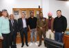 Cricketer Suresh Raina and DGP Dilbag Singh posing for a group photograph along with other dignitaries in Jammu.