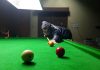 Cueist in action during Senior Billiards Championship at Billiards Hall, MA Stadium in Jammu.