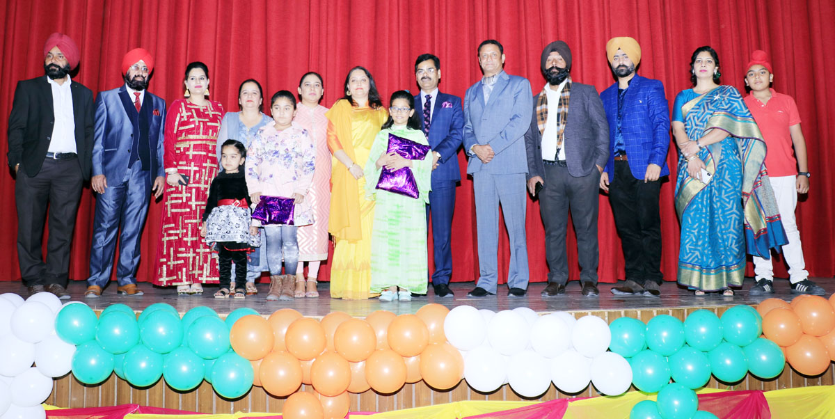Children posing along with chief guest and other dignitaries during Annual Day celebration of Sanfort on Monday. Children posing along with chief guest and other dignitaries during Annual Day celebration of Sanfort on Monday.