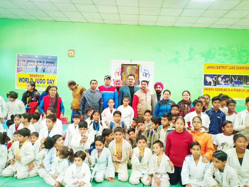 Judokas posing along with chief guest and other dignitaries during inaugural ceremony of Jammu District Judo Championship in Jammu. Judokas posing along with chief guest and other dignitaries during inaugural ceremony of Jammu District Judo Championship in Jammu.