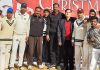 Winner team players and dignitaries posing for group photograph at Jammu on Friday.