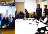 Governor interacting with students through video conferencing during e-inauguration ceremony of ICT Labs and CAL Centres on Tuesday.