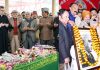 Dr Farooq Abdullah, Omar Abdullah and others paying tributes to Lt. Sheikh Mohd Abdullah at his Mazar in Srinagar (L) and senior NC leader Devender Singh Rana and others paying tributes in Jammu (R).