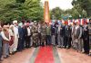 Army officers, ex-servicemen and others posing for photograph after paying tributes to war heroes at Pannu War Memorial Akhnoor on Wednesday.