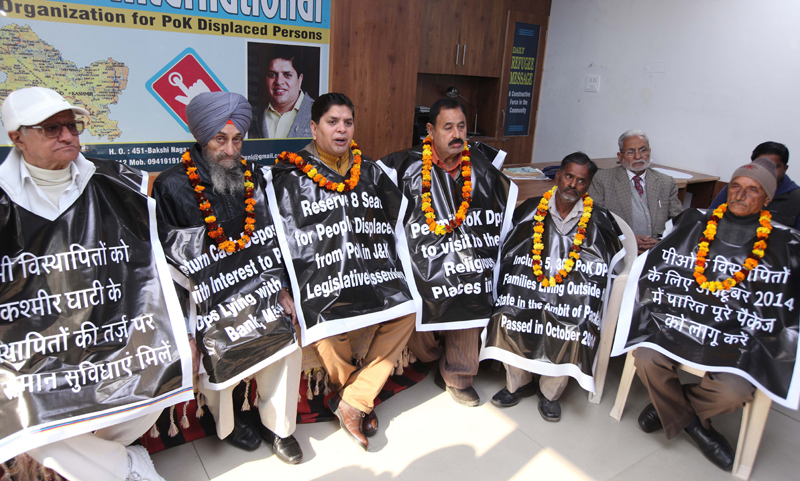 PoK DPs sitting on chain dharna at headquarter of SOS International in Jammu. -Excelsior/Rakesh PoK DPs sitting on chain dharna at headquarter of SOS International in Jammu. -Excelsior/Rakesh