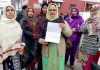 Female multipurpose health workers during a protest demonstration in Srinagar. —Excelsior/Shakeel