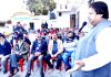 Senior Cong leader Raman Bhalla addressing public meeting at Bandhu Rakh in Gandhi Nagar on Sunday.