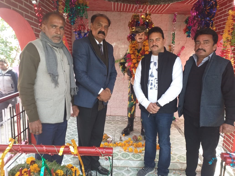 Former Minister and senior NC leader SS Slathia accompanied by others, paying tributes to martyr at a function in Vijaypur area on Wednesday. Former Minister and senior NC leader SS Slathia accompanied by others, paying tributes to martyr at a function in Vijaypur area on Wednesday.