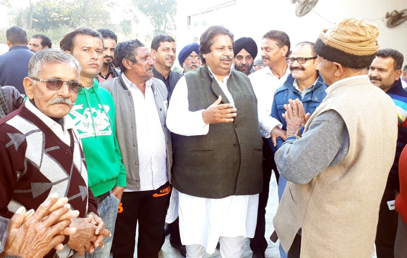 Senior Cong leader Raman Bhalla interacting with people in Gandhi Nagar area on Wednesday. Senior Cong leader Raman Bhalla interacting with people in Gandhi Nagar area on Wednesday.