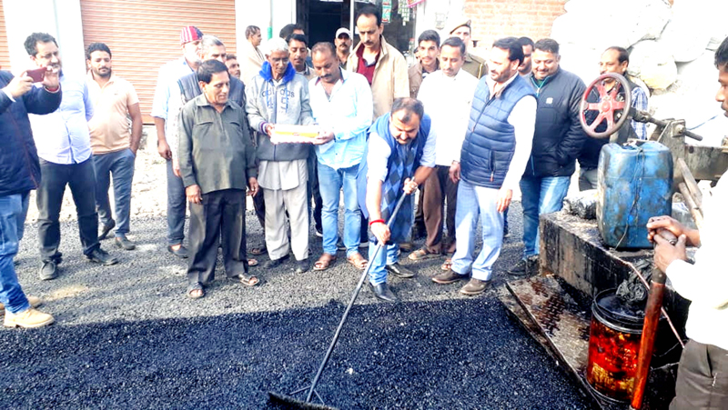 MLC Vikram Randhawa kick-starting blacktopping of road in Gandhi Nagar on Monday. MLC Vikram Randhawa kick-starting blacktopping of road in Gandhi Nagar on Monday.