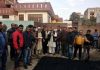 Former Deputy CM, Kavinder Gupta kick starting black topping of lanes at Chinar Mohalla, Channi Rama on Wednesday.