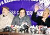 Former Congress leader Gani Vakil joining Peoples Conference in presence of Sajad Lone in Srinagar. -Excelsior/Shakeel