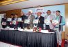 Union Joint Secretary Charanjeet Singh and others releasing brochure on Himayat on Thursday.