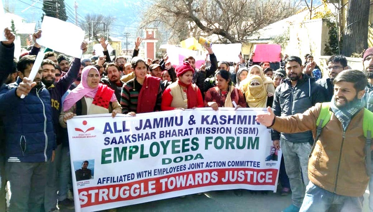 SBM employees raising slogans during protest rally in district Doda on Tuesday. -Excelsior/Rafi Choudhary SBM employees raising slogans during protest rally in district Doda on Tuesday. -Excelsior/Rafi Choudhary