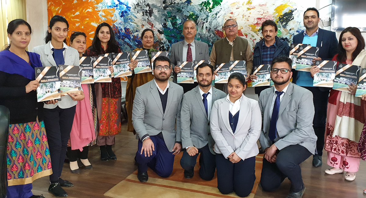 VC, University of Jammu, Prof Manoj K. Dhar along with 'The Business School' faculty and students during launch of website at Jammu on Monday. VC, University of Jammu, Prof Manoj K. Dhar along with 'The Business School' faculty and students during launch of website at Jammu on Monday.