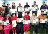 Students alongwith dignitaries displaying Brochure of Vishwa Bharati College of Education.