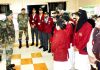 A senior Army officer interacting with students during the flagged in ceremony of capacity building tour in Poonch district.