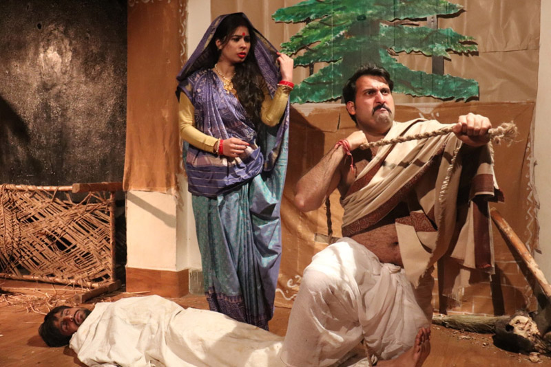 A scene from the play 'Sadgati' staged in Jammu on Wednesday. A scene from the play 'Sadgati' staged in Jammu on Wednesday.