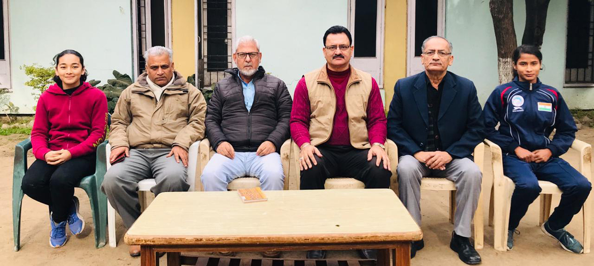 Shivani Charak (extreme right) and Asma Gul (extreme left) posing with the officials of J&K State Sports Council. Shivani Charak (extreme right) and Asma Gul (extreme left) posing with the officials of J&K State Sports Council.