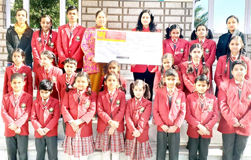 Kids and Management of Sprawling Buds School posing along with representatives from HelpAge India in Jammu on Tuesday. Kids and Management of Sprawling Buds School posing along with representatives from HelpAge India in Jammu on Tuesday.