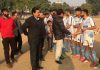 Dignitaries interacting with young footballers during 12th Christmas Gold Cup Footbal Tournament in Jammu.