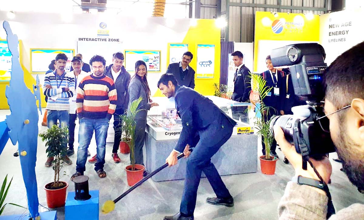 Visitors taking part in 'strike the hammer' during trade show. Visitors taking part in 'strike the hammer' during trade show.