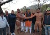 Wrestlers posing along with the chief guest and other dignitaries at Jindrah in Jammu on Tuesday.