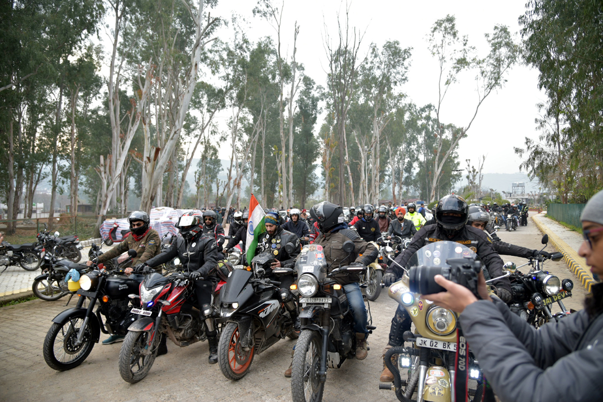 page14 Director Tourism flagging off Bike rally in Jammu.
